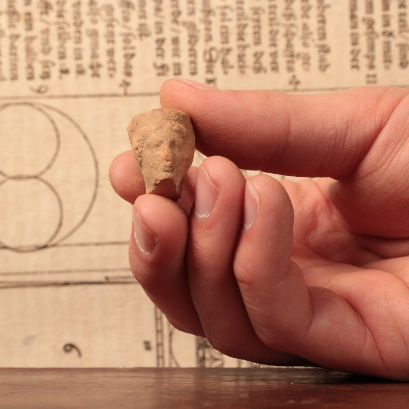 Roman Terracotta Pottery Piece, Female Head (0.8 inches) - c. 100 to 300 CE - Roman Empire