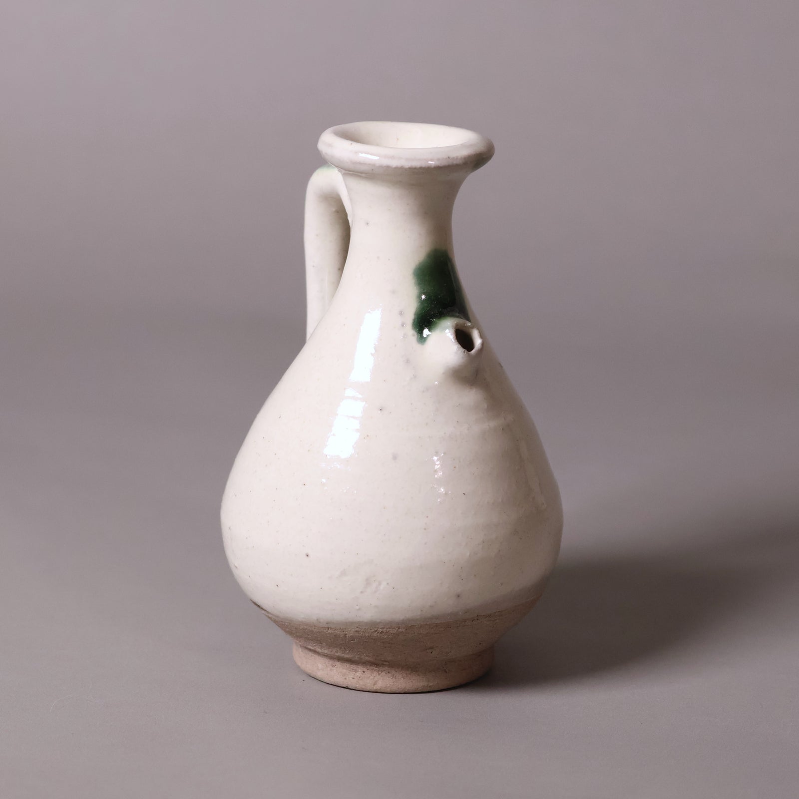 China, Qing Dynasty, Small White Glazed Earthenware Pitcher - c. 1700s CE - Imperial China