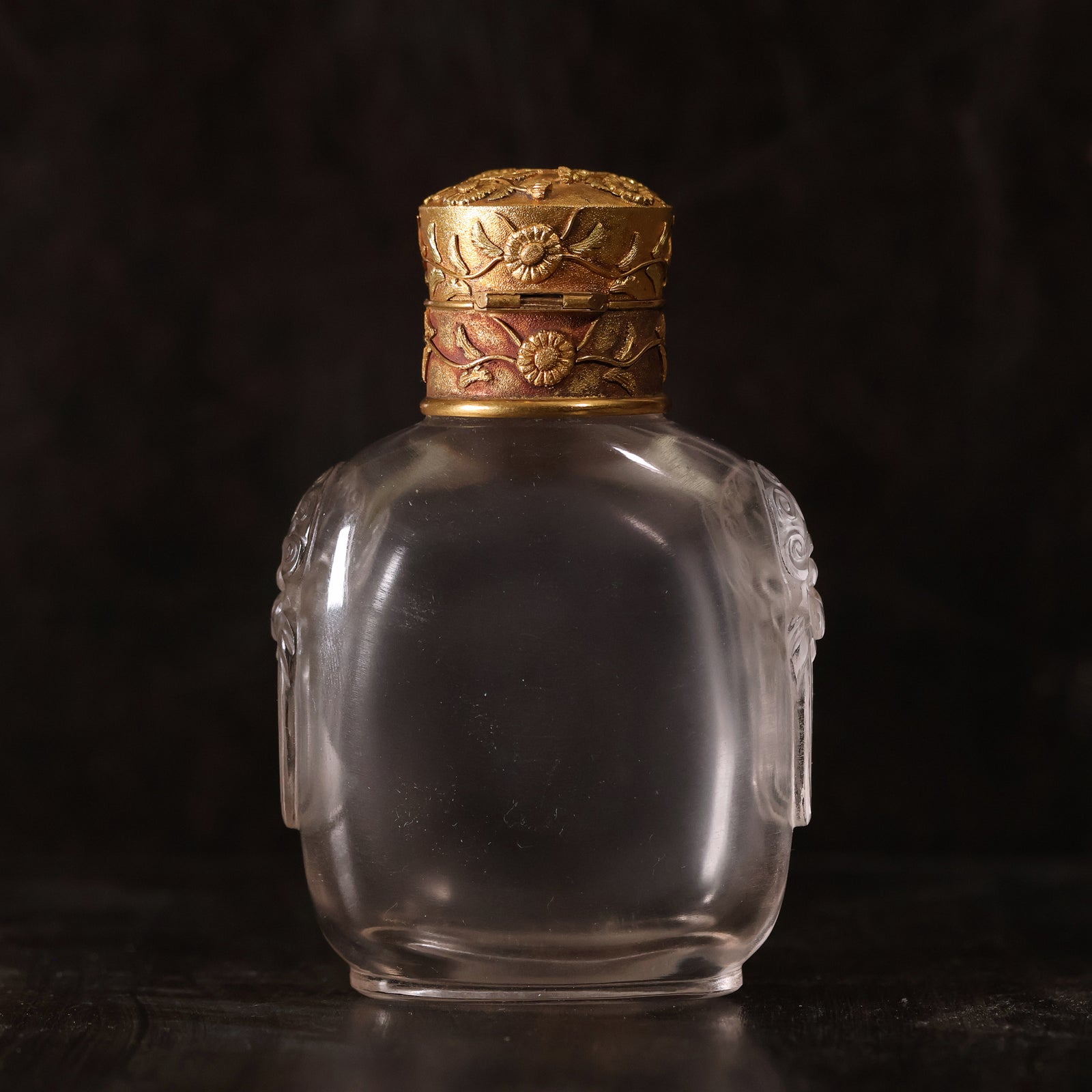 China, Qing Dynasty, Rock Crystal Snuff Bottle with Hand Carved Gold Plated Floral Cover - 1750 to 1830 CE - Imperial China