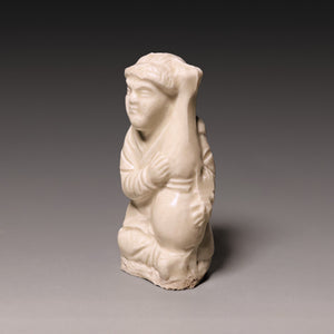 Song Dynasty, White Celadon Glazed Seated Figure - c. 900s to 1200s CE - Imperial China