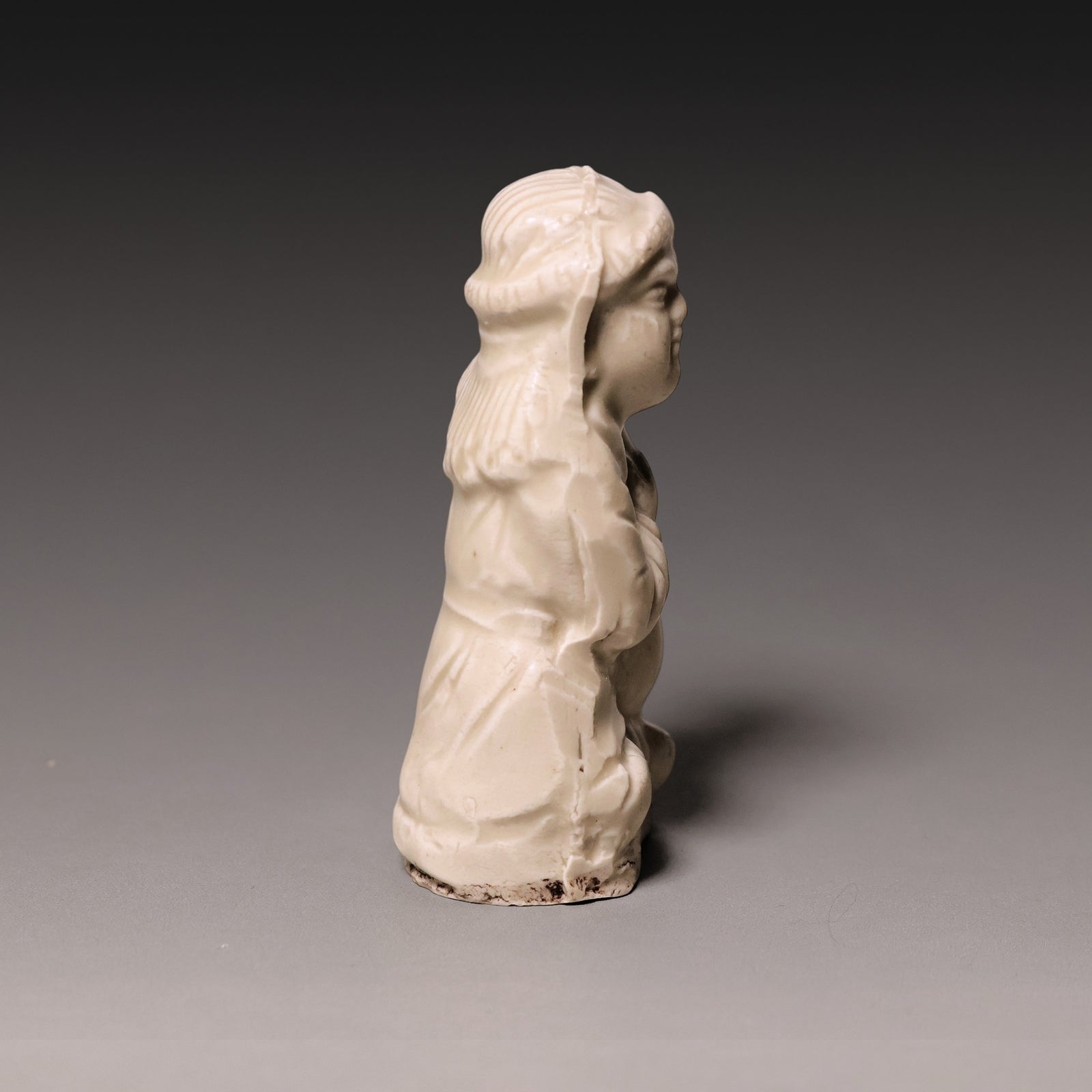Song Dynasty, White Celadon Glazed Seated Figure - c. 900s to 1200s CE - Imperial China
